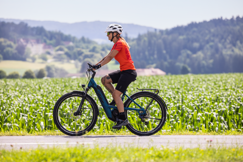 a woman riding a bike